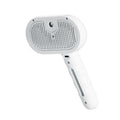 White pet steam brush with silicone bristle pad and steam head