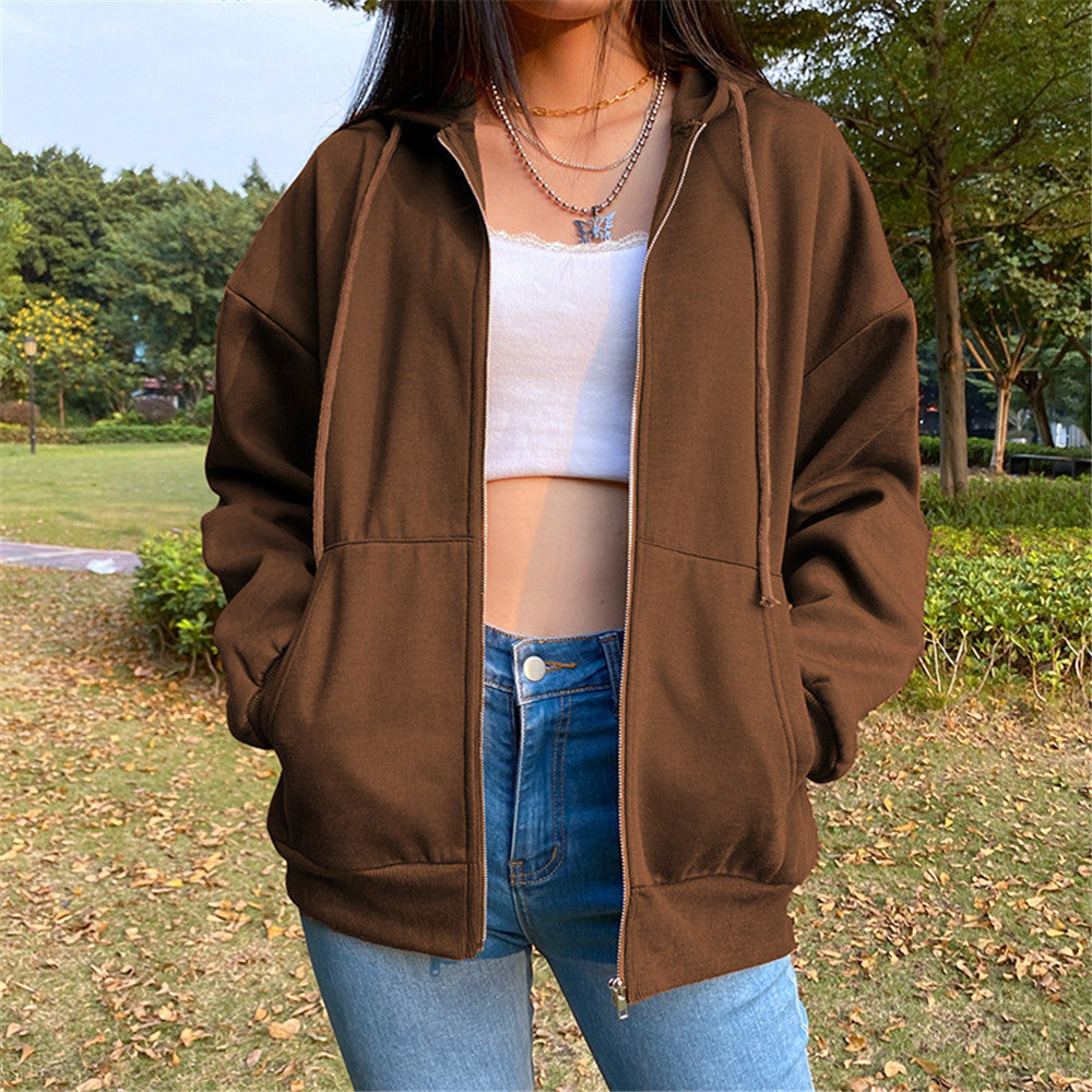 Brown zip-up hooded jacket with long sleeves and front pockets, loose fit