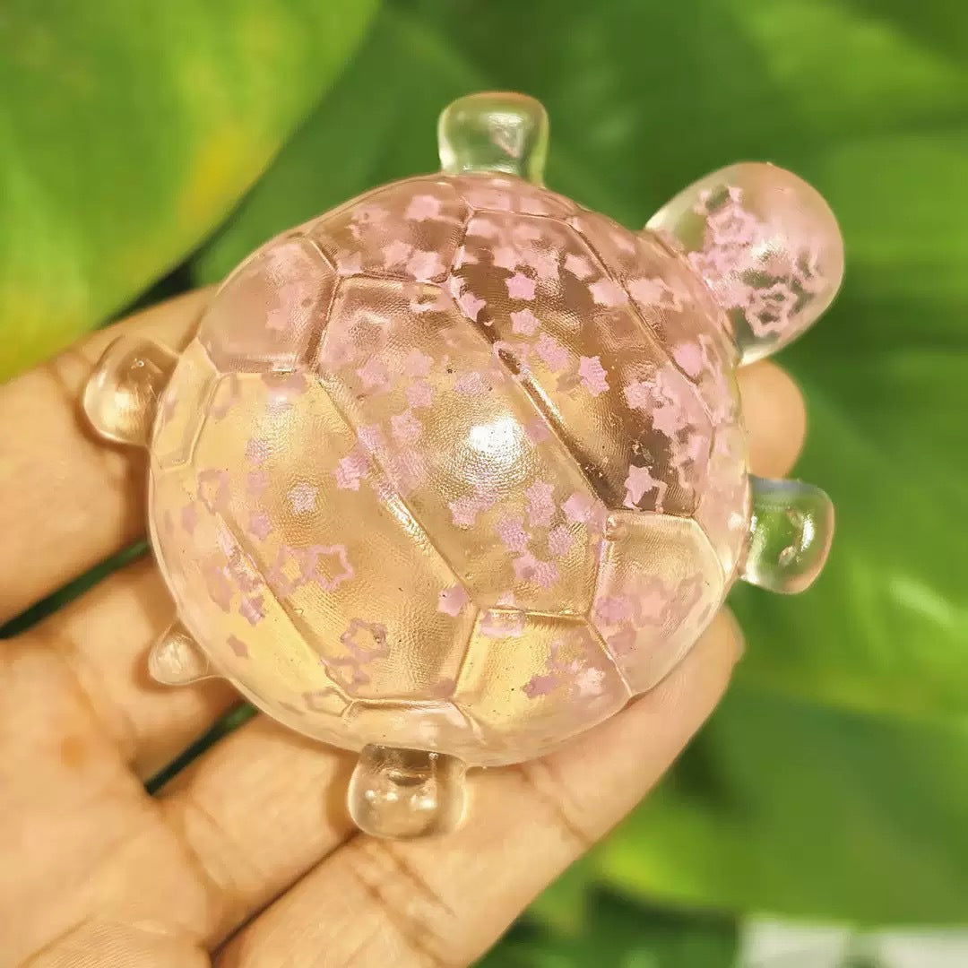 Clear gold glitter bubble-bead sea star stress toy, slow-rebound, held