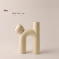 Glazed ceramic cat vase in beige, open-top design with small cat-face spout
