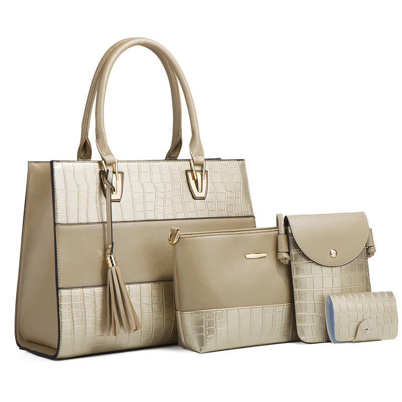 Crocodile-embossed PU handbag set in beige, with tote, tassel, and crossbody mini bag