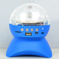 Portable Bluetooth speaker with built-in LED dome and blue control panel ports