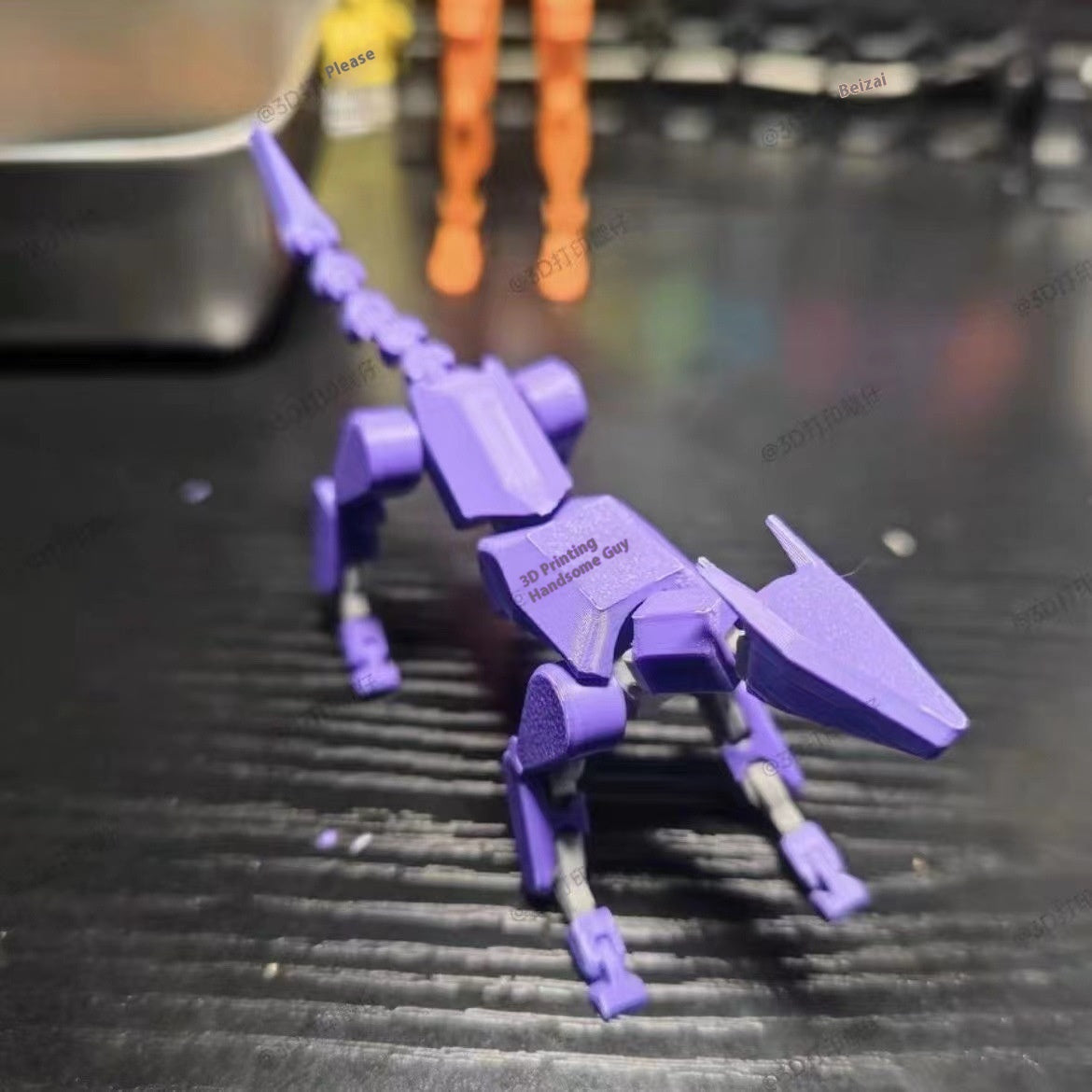 Multi-jointed action figure robot, purple with wing-like arms