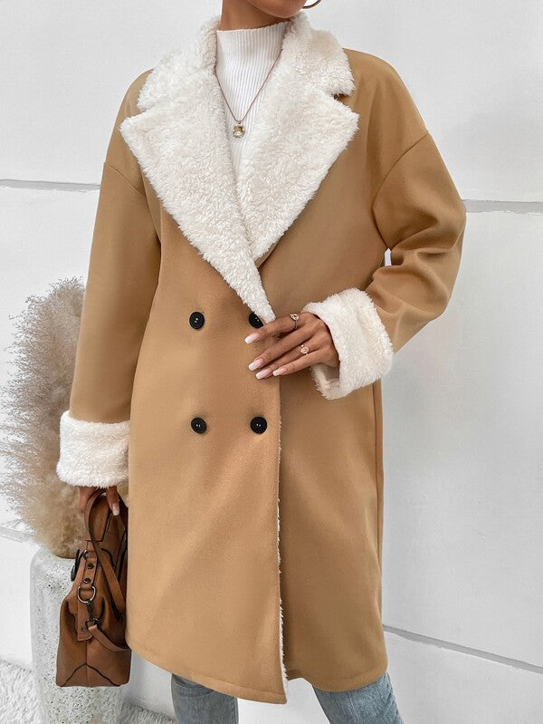 Women’s tan wool coat with white sherpa lapel trim and double-breasted black buttons