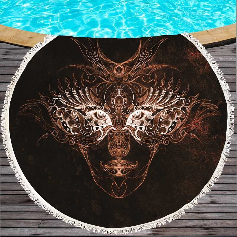 Round beach towel with colorful feathers and tassels