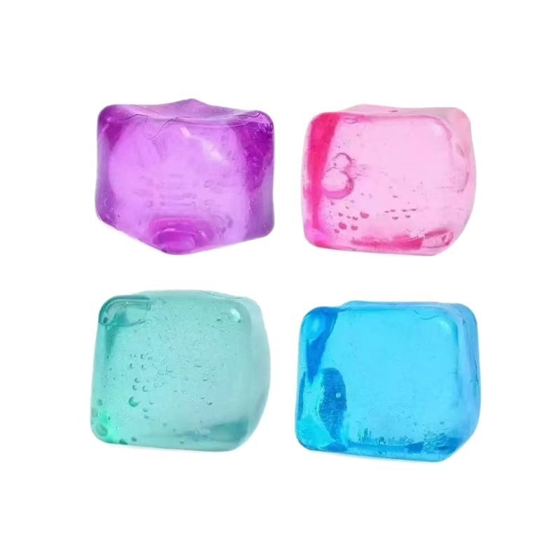 Four translucent water-cube stress-relief squishy toys in purple, pink, teal, and blue