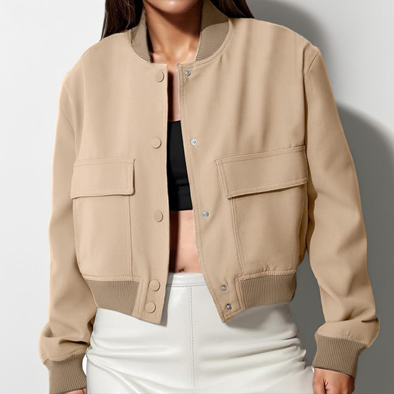 Beige button-up stand-collar jacket with two flap chest pockets and ribbed cuffs