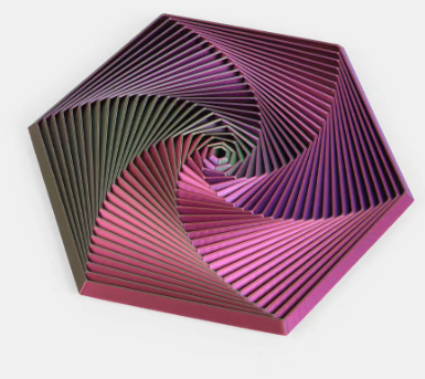 Hexagon sensory fidget toy with maroon and pink spiral ridges and dark center.