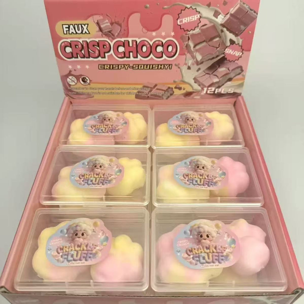 Pink faux chocolate squeeze toy set in clear compartments, with cream and pastel pieces