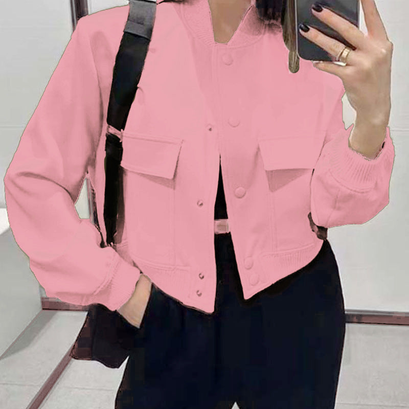 Pink button-up stand-collar jacket with front snap buttons and chest pockets
