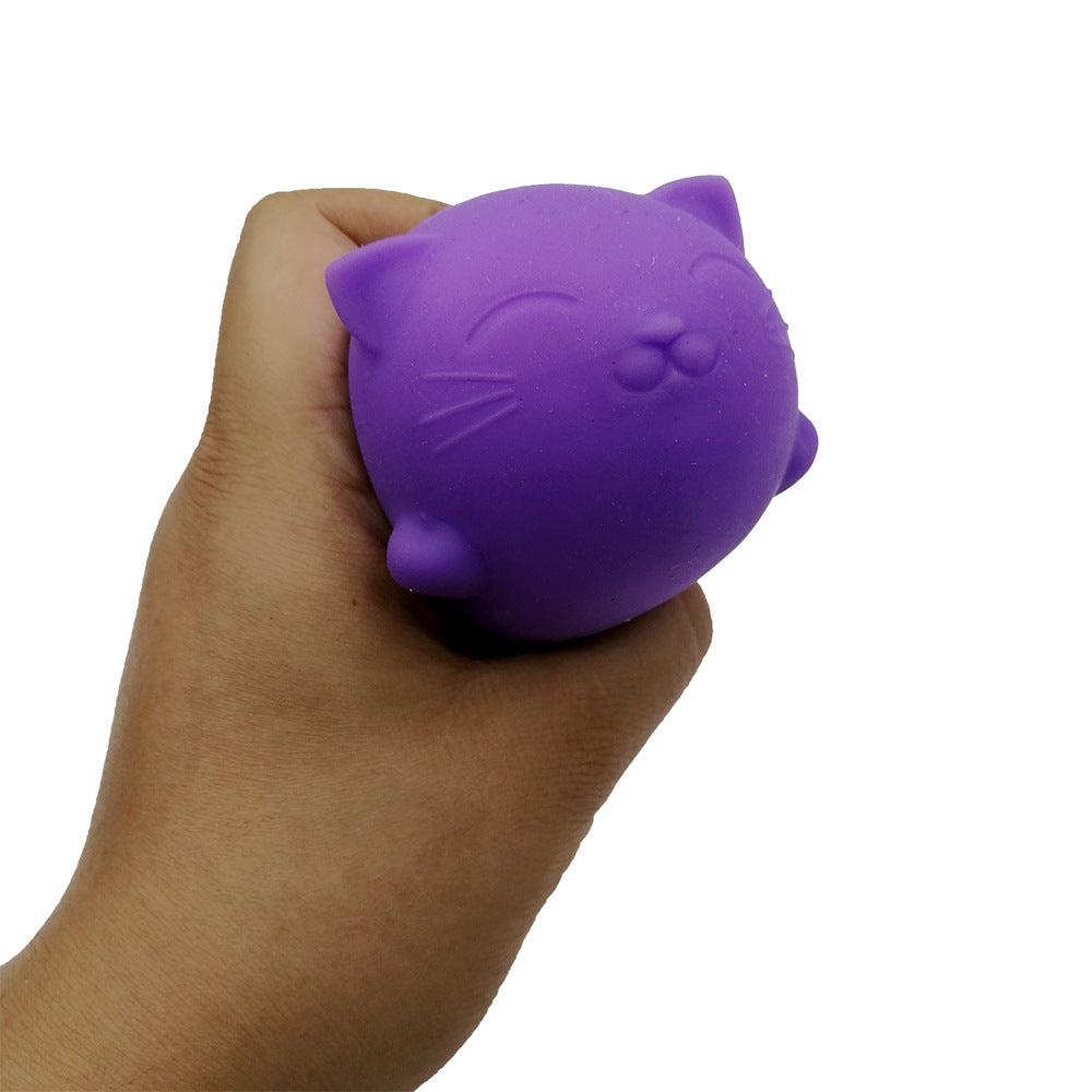 Purple cat-shaped stress relief venting ball in a hand