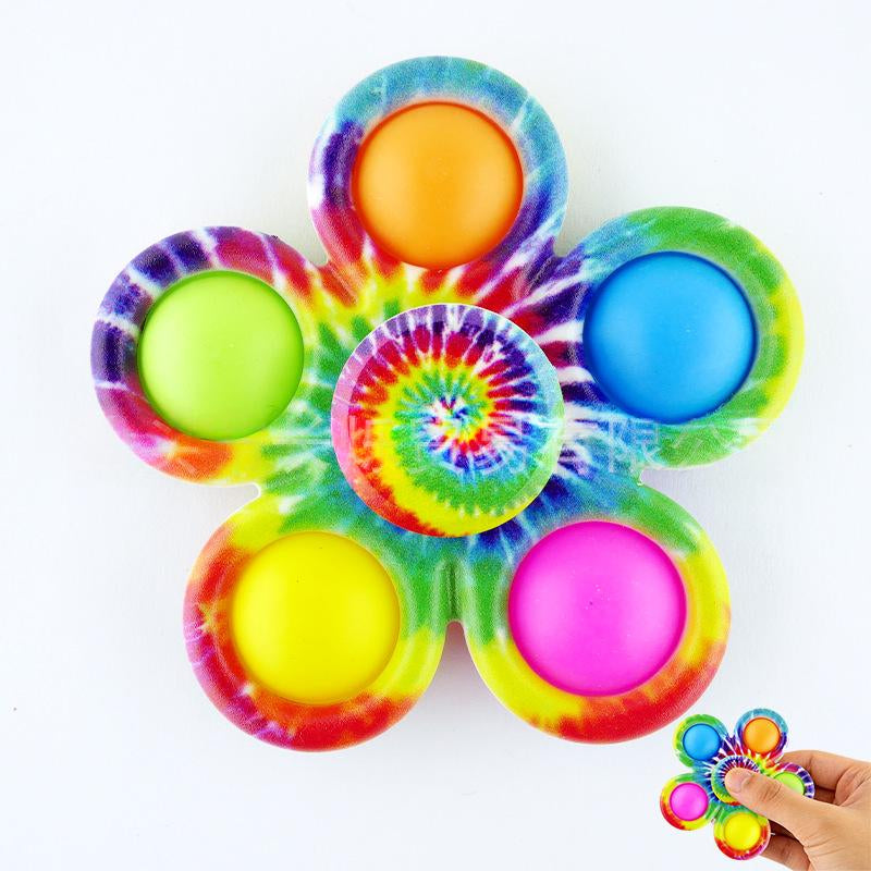 Rainbow tie-dye fidget spinner stress-relief toy with orange, green, blue, and pink caps