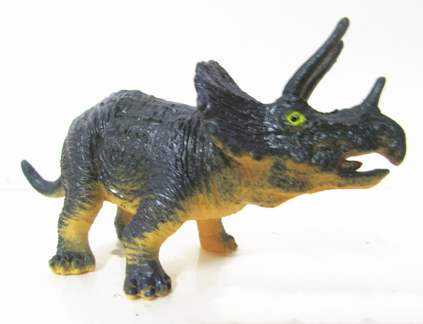 Blue-gray dinosaur model figure with green eye details and textured skin