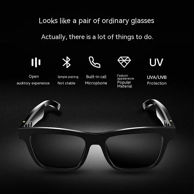 Black smart audio glasses with dark lenses and prominent side speaker housings