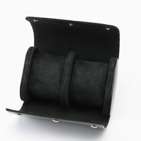 Three-slot travel watch case with black exterior and padded inner watch holders