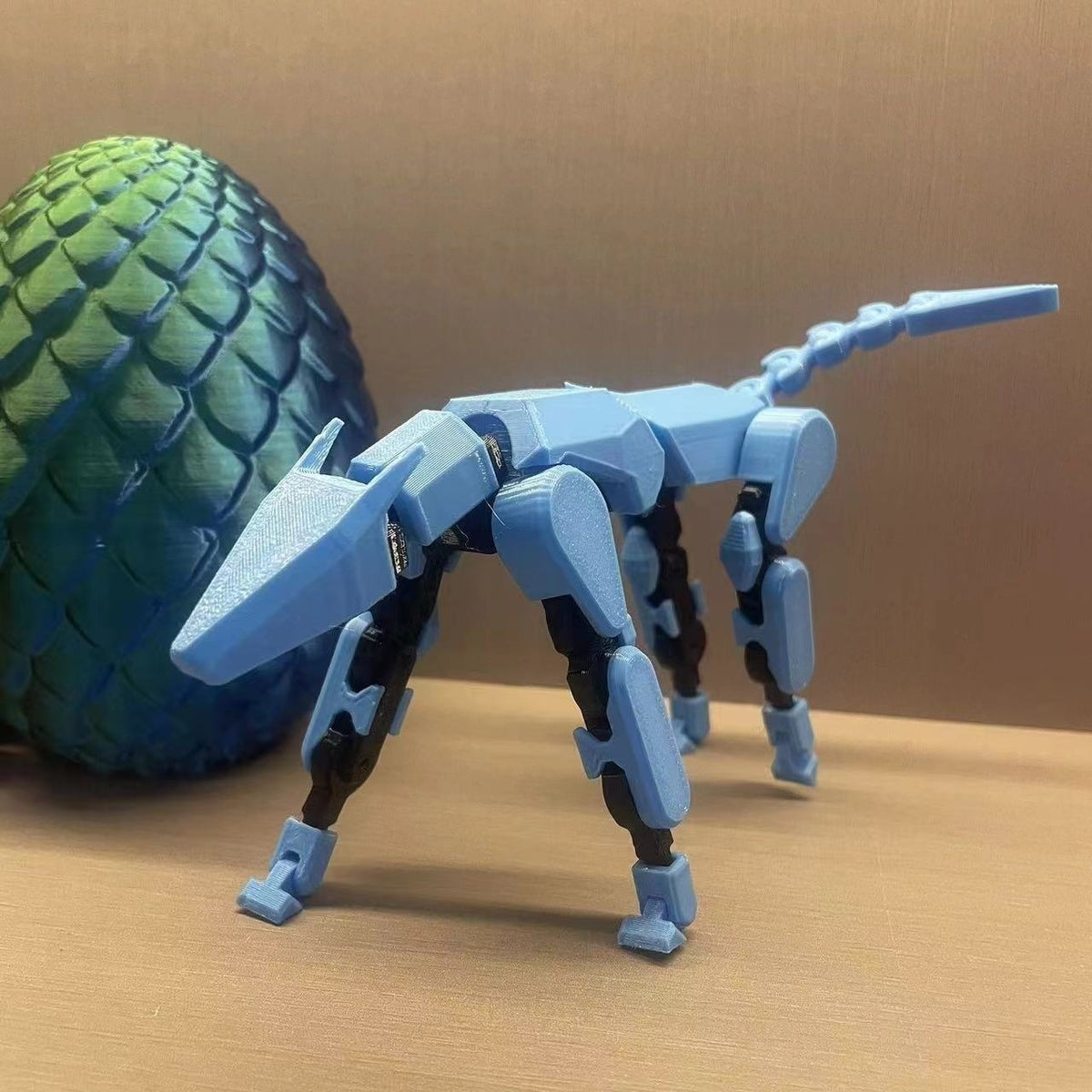 Multi-jointed robot dog action figure, light blue four-legged design