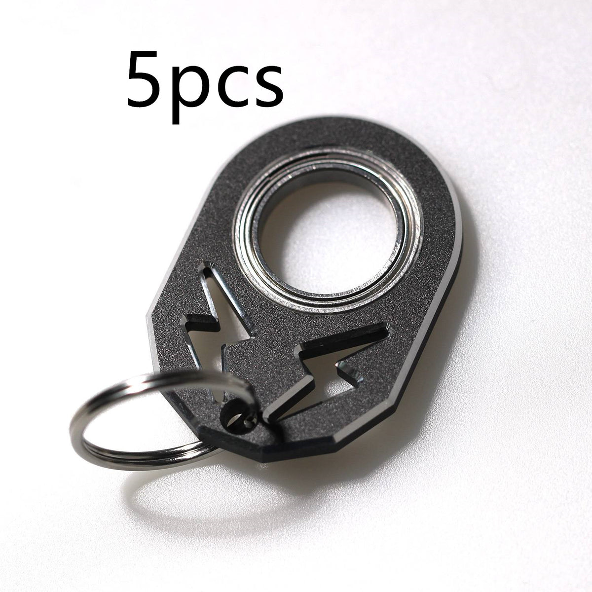 Black rotating decompression key chain with metal ring, 5-pack.