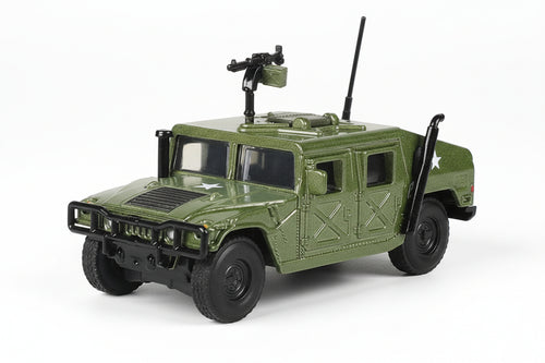 Green alloy military model vehicle with turret and mounted machine gun accessories