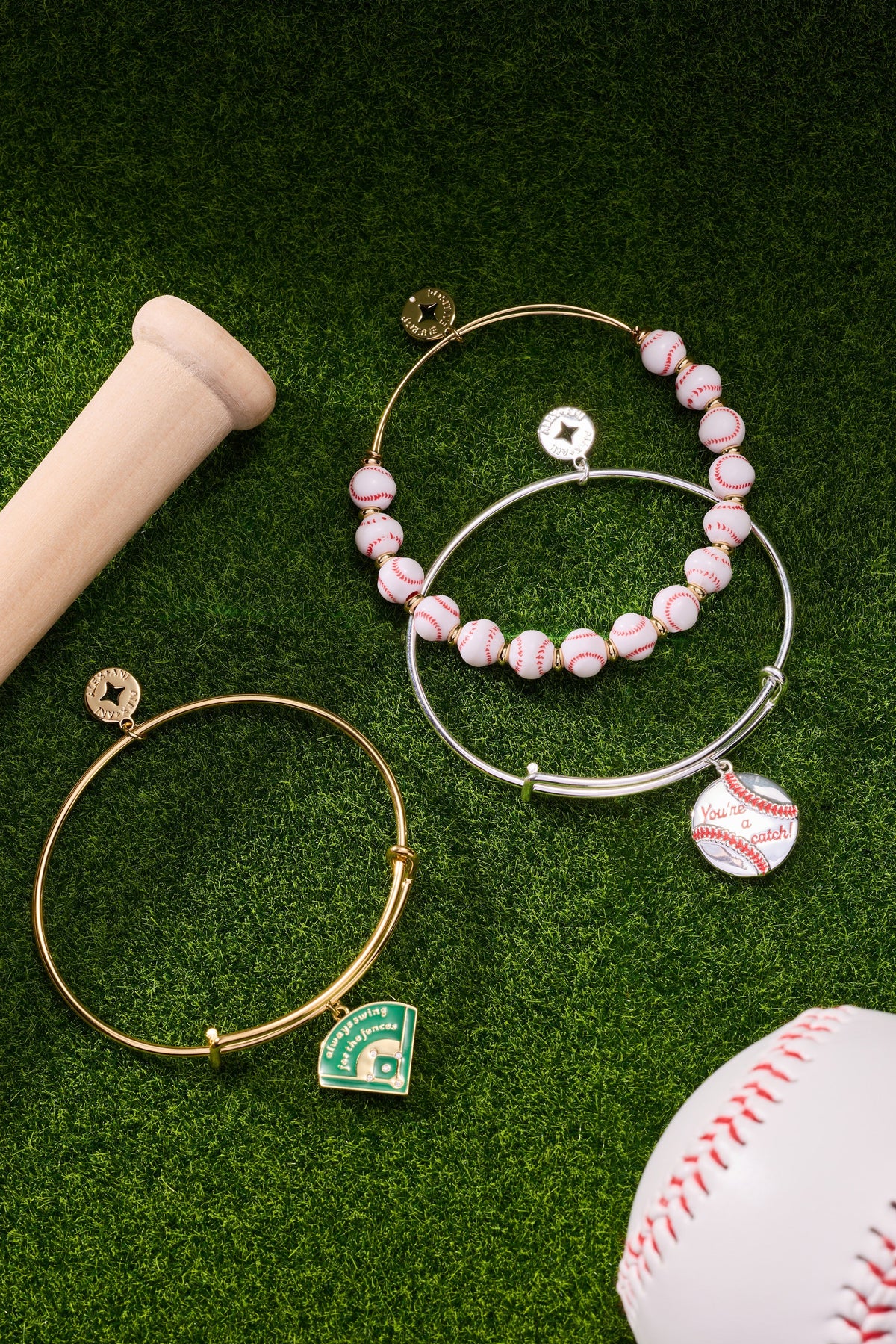 Gold beaded baseball bangles with white/red ball beads and dangling enamel charms
