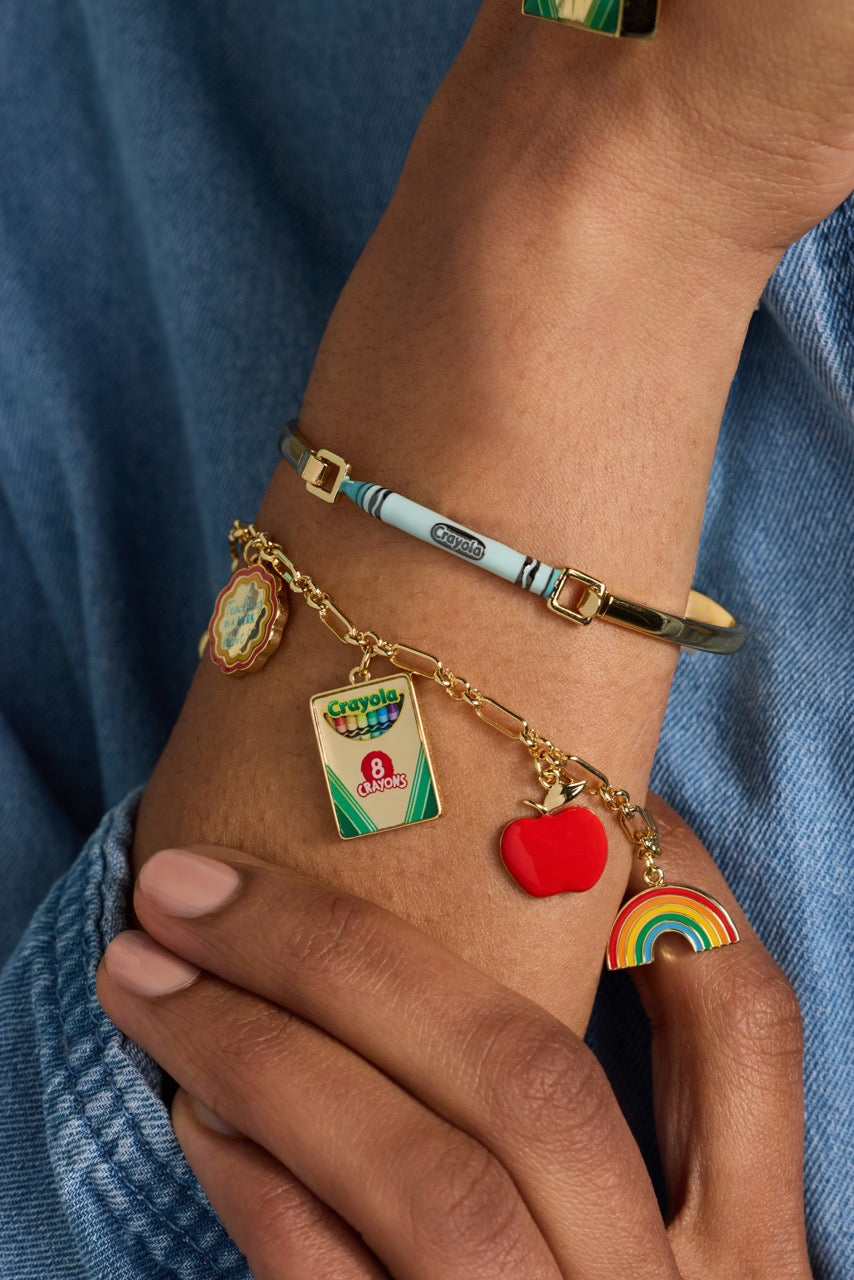 Gold chain bracelet with crayon pack, red heart, rainbow charm, and teacher-themed apple charm