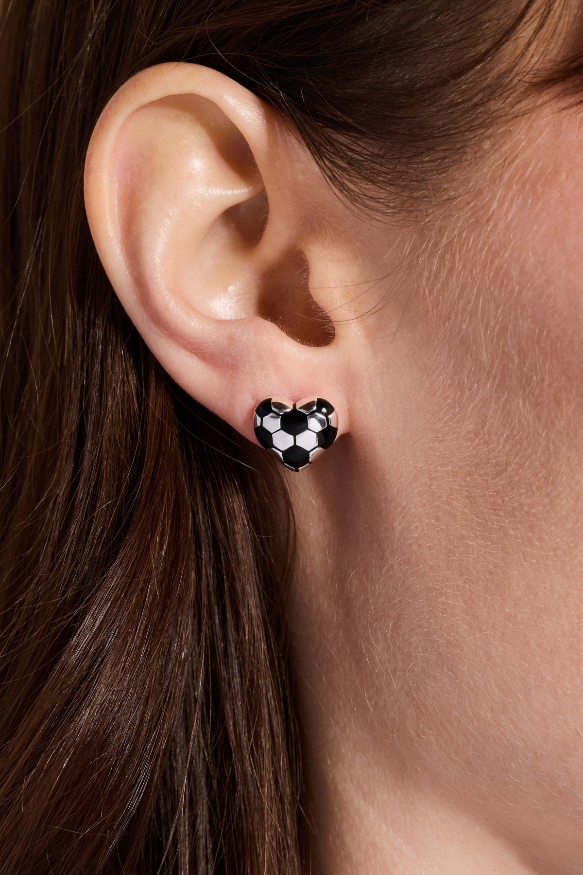 Soccer ball heart stud earring in black and white on silver stud post