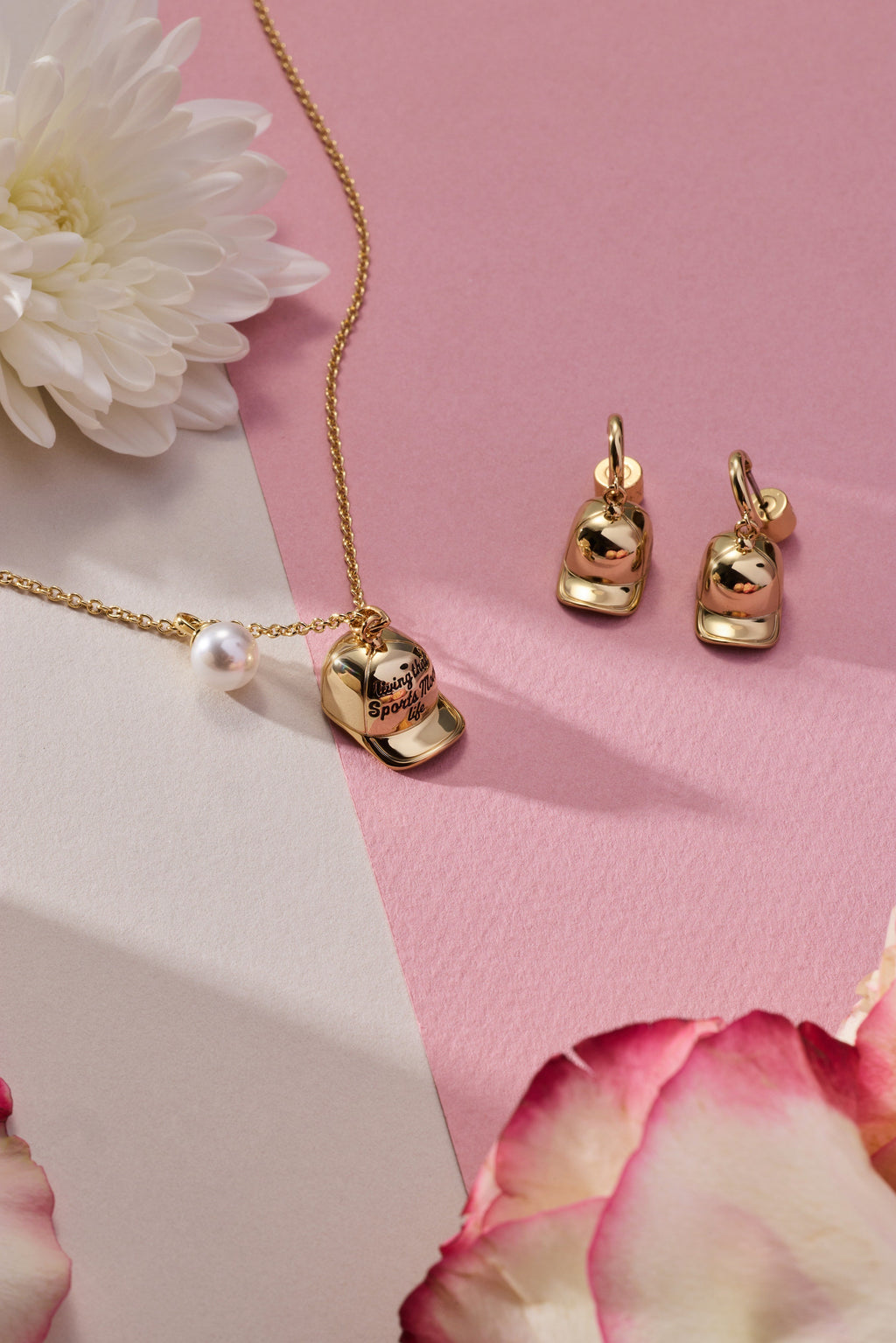 Gold baseball charm necklace with pearl bead and cap pendant, charm detail