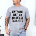 Grey adult graphic T-shirt with bold black "AWESOME LIKE MY YOUNGEST DAUGHTER" text