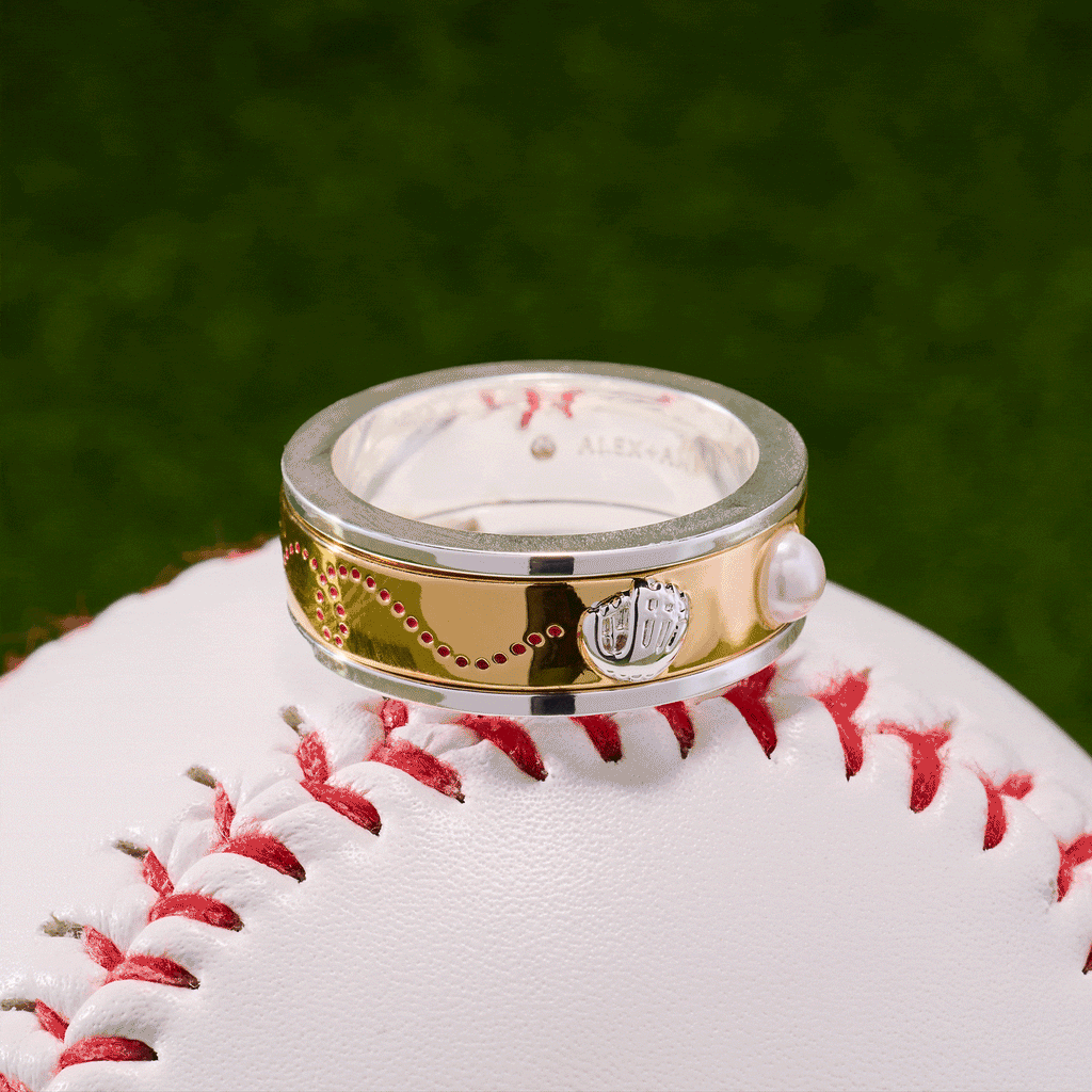 Two-tone baseball fidget ring with baseball stitching pattern and pearl detail