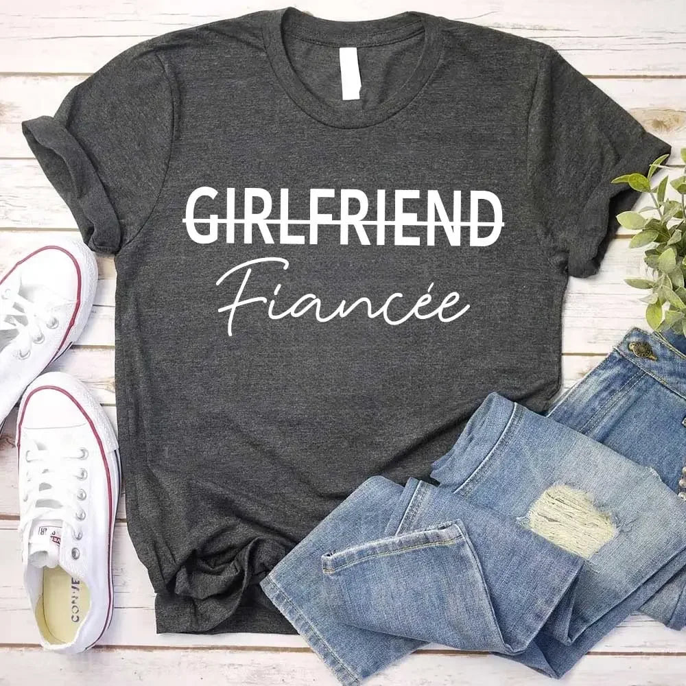 Dark gray girlfriend tee with "Girlfriend Fiancée" graphic