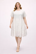 White eyelet tiered flutter sleeve dress