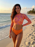 Women’s rashguard set, long-sleeve floral crop top with orange high-cut bottoms