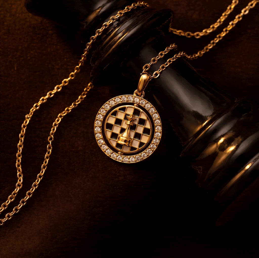 Gold chess spinner pendant on chain, round crystal halo with chess grid center