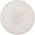 White round wall carving with radial cutout design and central medallion