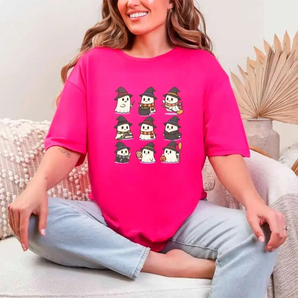 Bright pink Halloween graphic T-shirt with cute witch and ghost characters
