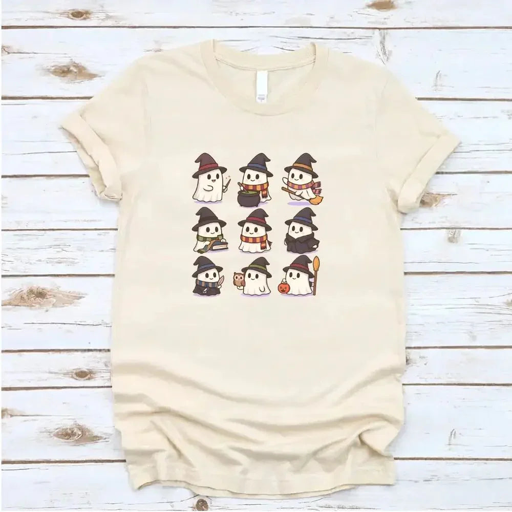 Cream Halloween graphic T-shirt with cute witch, ghost, and pumpkin characters