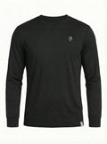 Black long-sleeve performance shirt with small chest logo