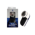 Handheld fabric shaver with circular head, white and black body, cleaning brush included