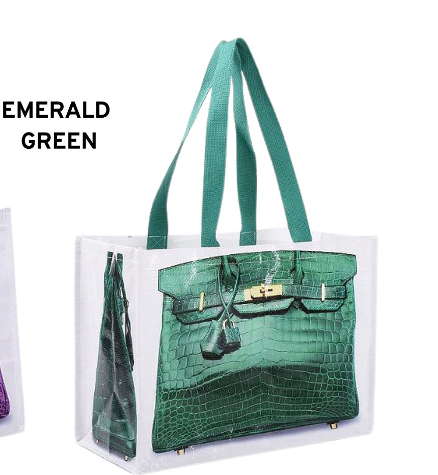 Emerald green reusable tote bag with two top handles and textured front panel