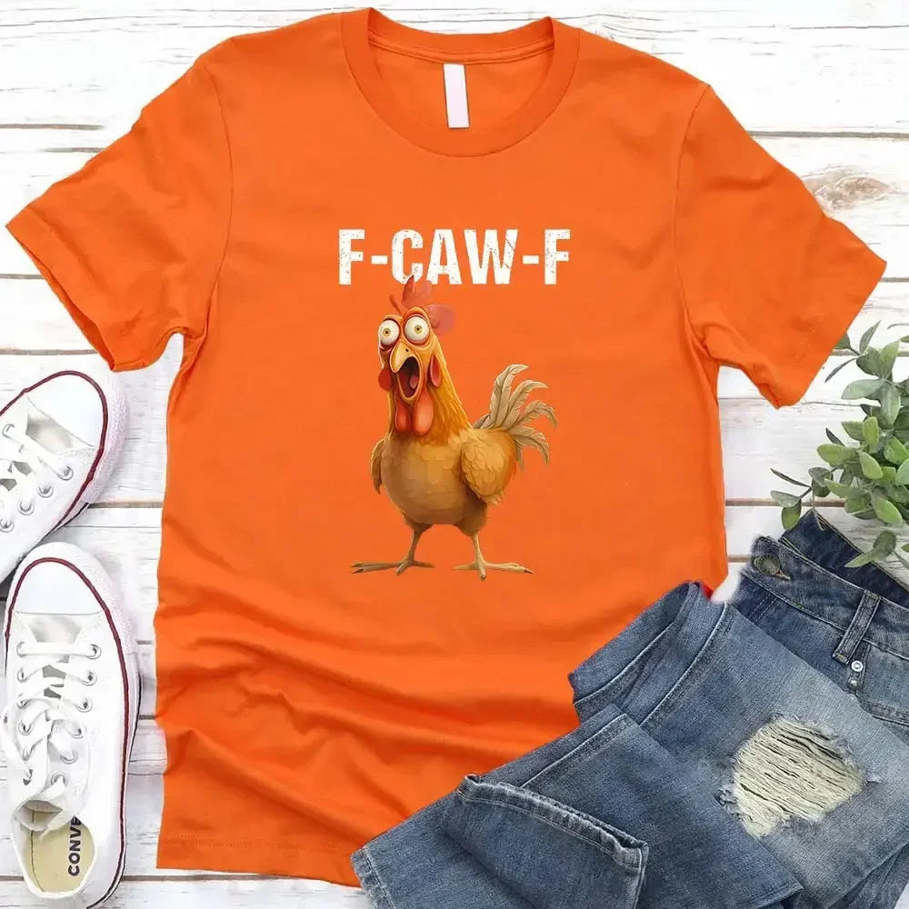Orange unisex T-shirt with F-CAW-F text and rooster graphic on chest