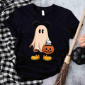 Black Halloween ghost cartoon T-shirt with pumpkin bucket graphic at center