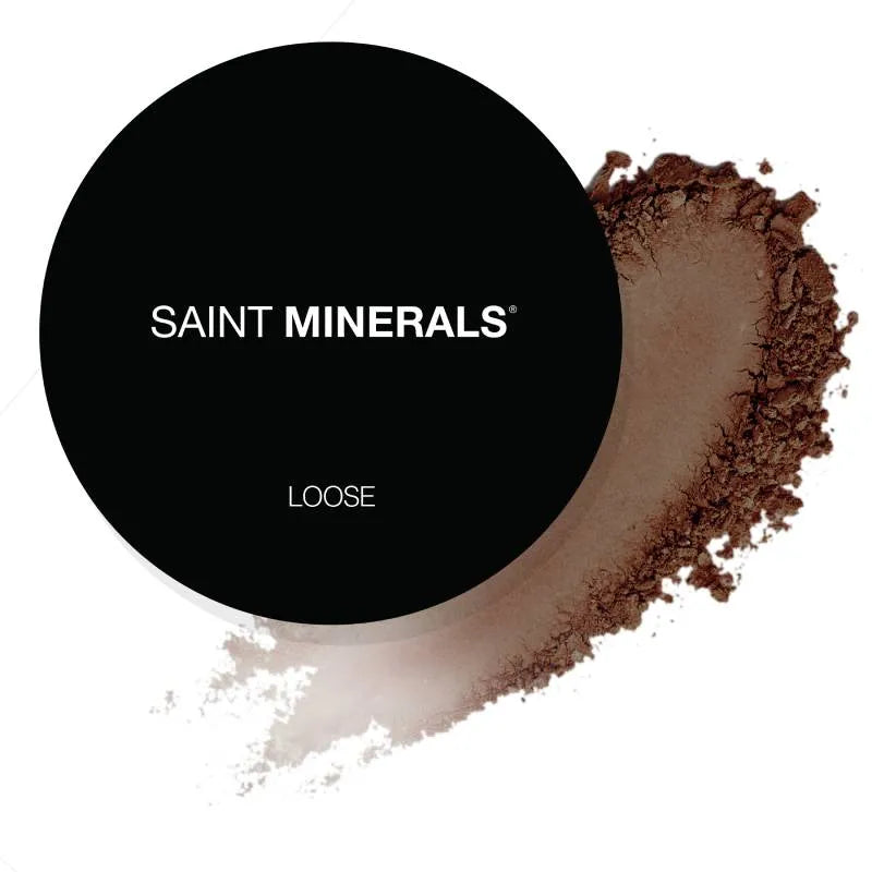 Loose powder compact with SAINT MINERALS label and brown powder swatch