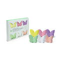 Butterfly-shaped bath bombs set in pastel colors with product box packaging