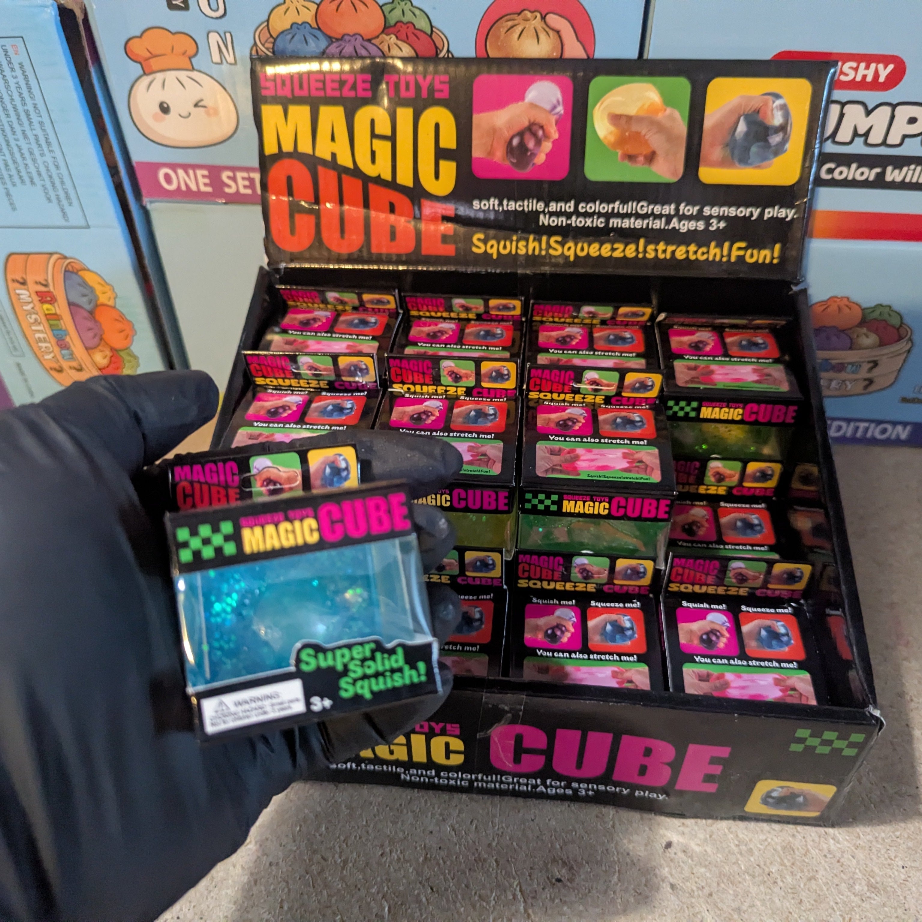 Blue Translucent Glitter Mini Magic Cube by Squeeze Toys (Slow-Rising Squish)