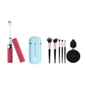 Pursonic travel bundle: blue electric toothbrush, makeup brushes, and black cleansing sponge