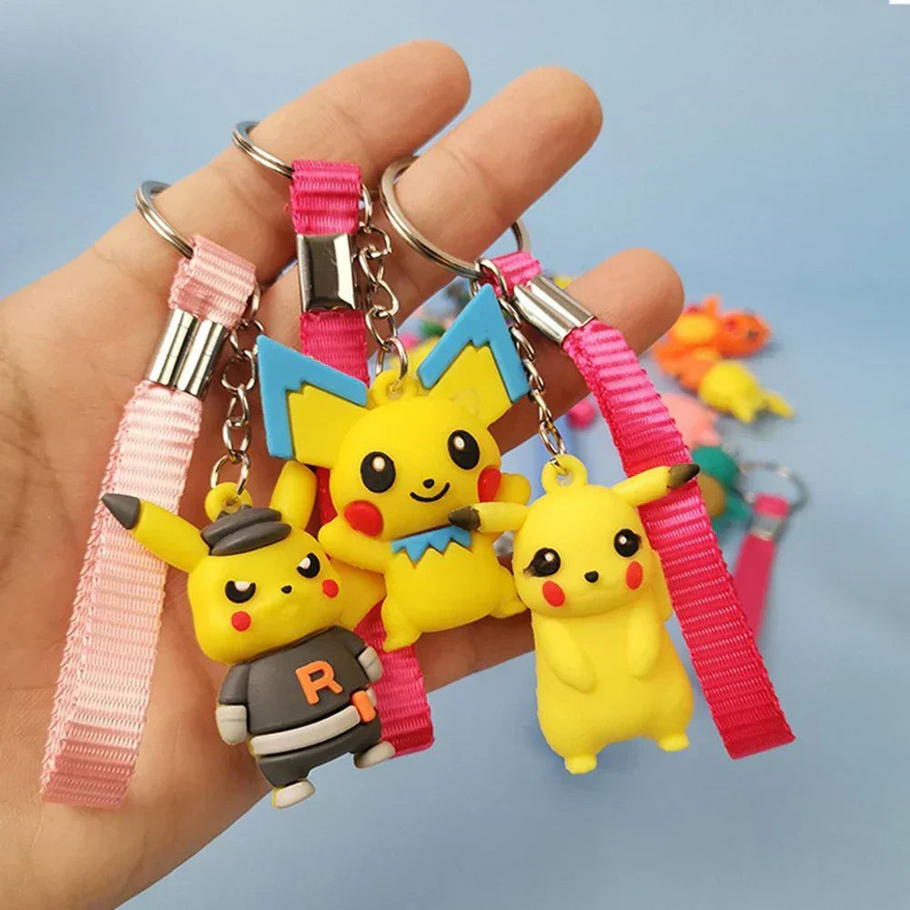 Pokemon keychain set: handheld cluster of charm keychains with pink lanyards