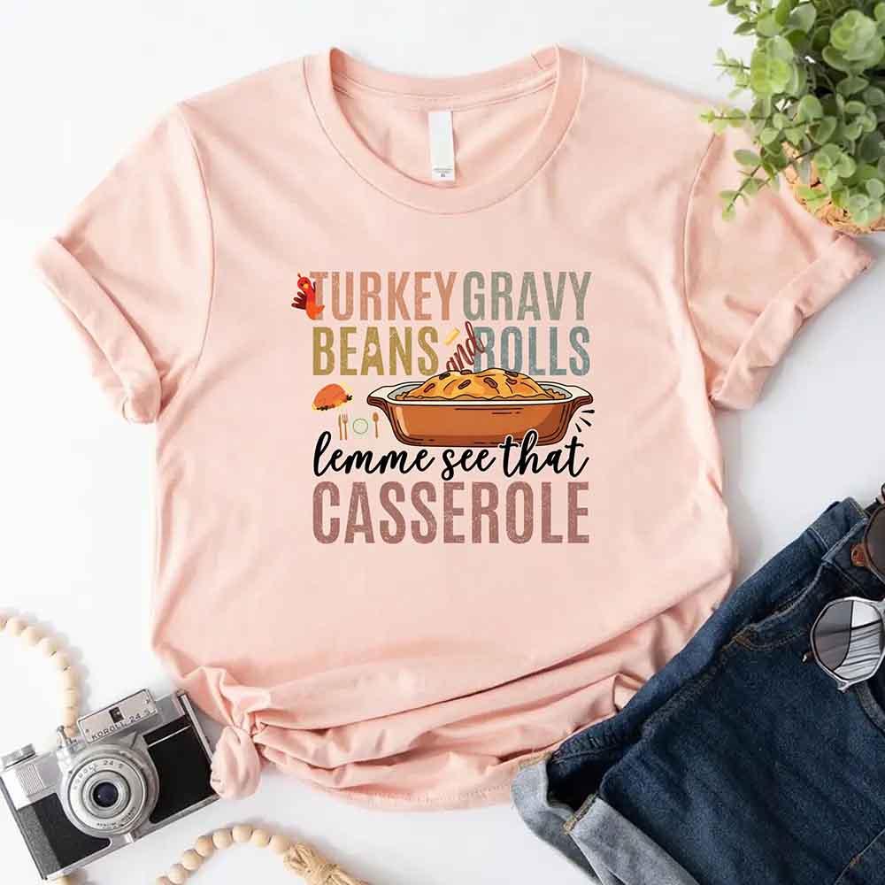 Peach crewneck T-shirt with “casserole” graphic and turkey gravy beans print