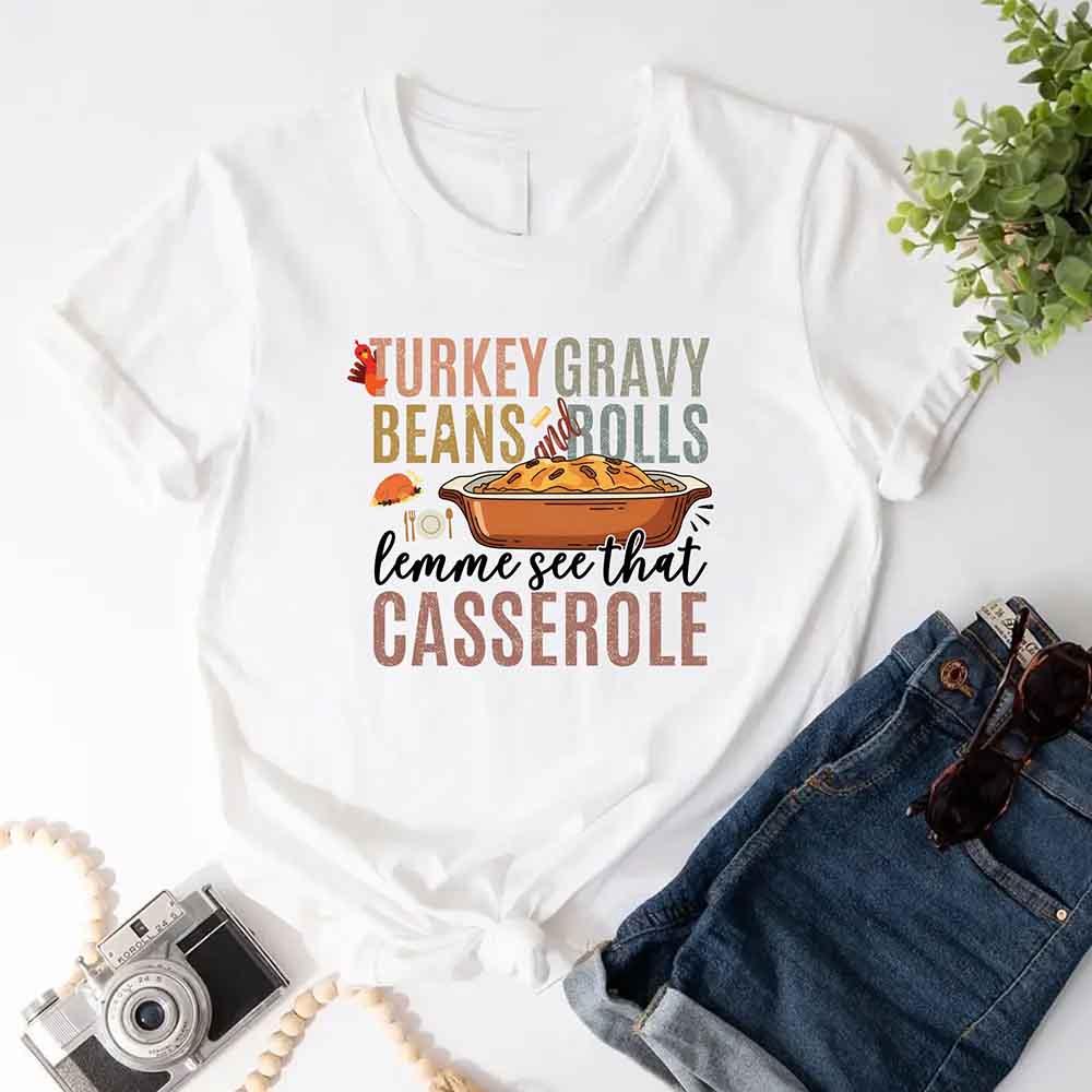 White Thanksgiving graphic T-shirt with “casserole” text and turkey gravy beans art