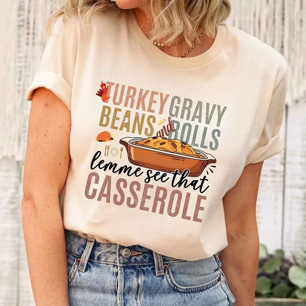 Cream crew-neck Thanksgiving graphic T-shirt with “casserole” text and dish illustration
