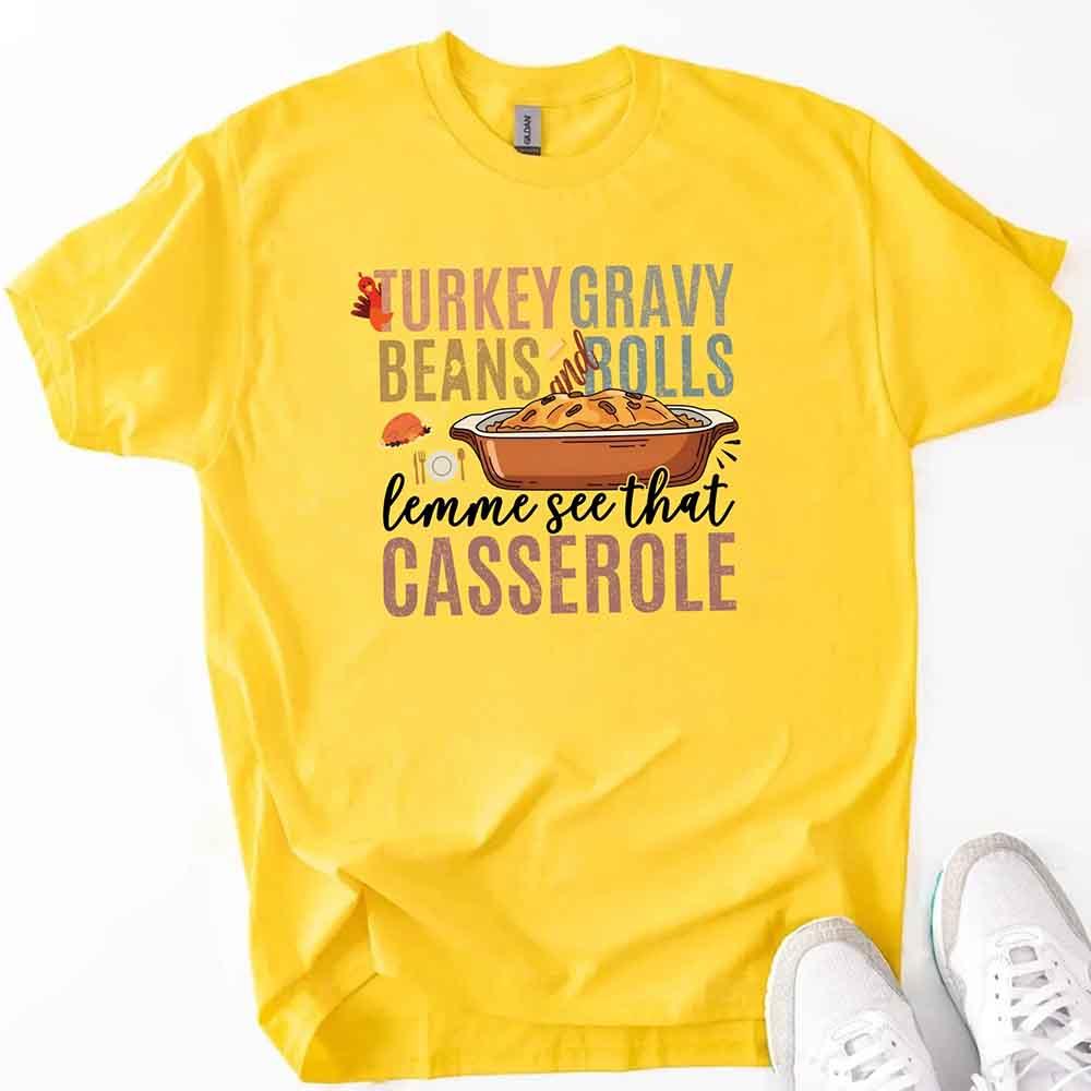 Yellow Thanksgiving graphic t-shirt with turkey gravy beans and rolls casserole print