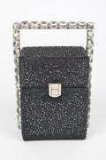 Black rhinestone party clutch with rectangular metal clasp and rhinestone handle frame